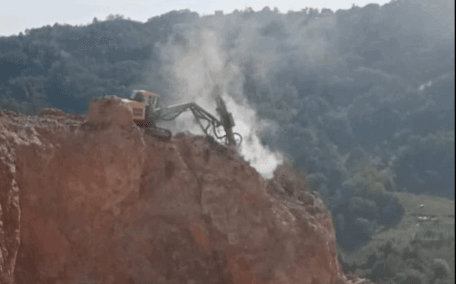 Drill rig on a hill